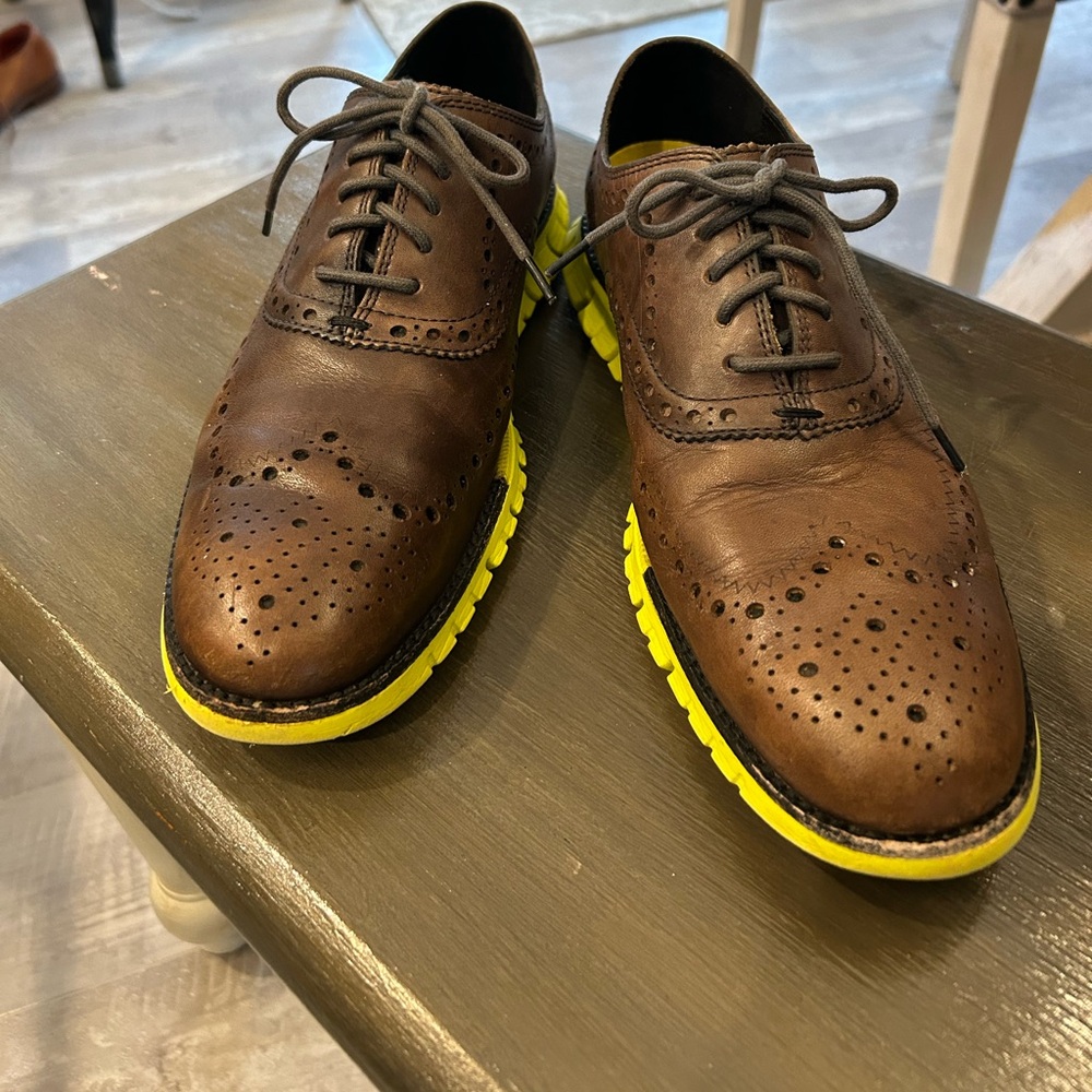 Cole Haan Men's Zerogrand Wingtip Oxford with a leather upper 9M